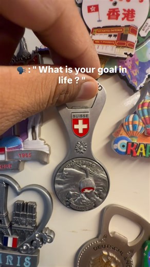 Chirag Khandelwal | Travel on Instagram: "🌍✨ “What’s your goal in life?” For me… it’s this. Not the magnets 🧲 themselves, but the stories they hold. Every piece on this board isn’t just a souvenir — it’s a moment in time. 🕰️ A sunrise I chased 🌅, a street I got lost in 🚶‍♂️, a stranger who became a friend 🤝, a meal that felt like home 🍲. From the bustling markets of faraway cities 🏙️ to the quiet whispers of mountains ⛰️, I’ve learned one thing — Life isn’t about collecting things. It’s 