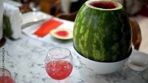 Refreshing watermelon vodka cocktail punch served on ice perfect for those hot summer days