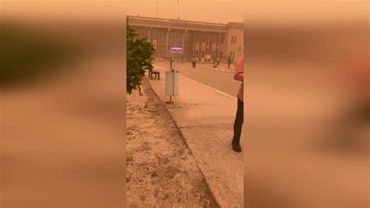 Iraq sandstorm turns sky orange and reduces visibility