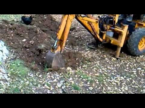 CASE Uniloader 1830 + Backhoe D100 en action