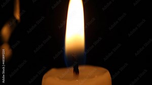 The spark discharge extinguishes the flame. A spark discharge can completely extinguish a candle flame.