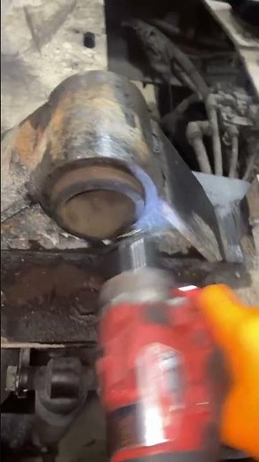 Removing fifth wheel bushings with a drill bit. #mechanic #fifthwheel #bushings #trucking