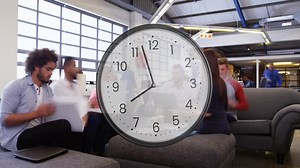 Animation of clock ticking over diverse business people in office | Premium Stock Video Footage