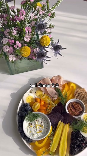 GIRL DINNER, 2.0 🧀 I teamed up with @WeightWatchers to create a filling and nutrient-packed snack plate, so your girl dinners can still be easy to make, but good for your health! WHAT YOU'LL NEED: CHEESE Goat Cheese Dip 3 tablespoons fresh goat cheese 1/4 cup Greek yogurt Juice from 1/3 lemon 1 tablespoon fresh dill, chopped 1 tablespoon fresh basil, chopped Salt and pepper to taste PROTEIN 2 oz Plain Turkey Breast 2 Hard Boiled Eggs PRODUCE 6 Yellow Grape Tomatoes, sliced in half 1/2 yellow pe