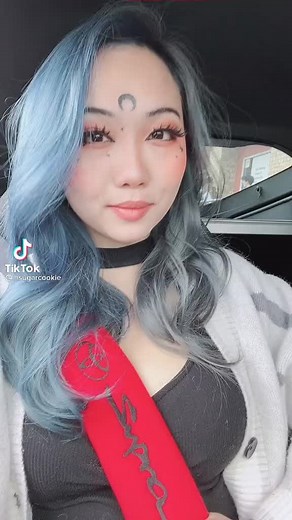 Light Blue Haired Trendsetter Inside a Car