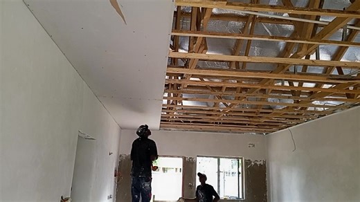 A sneak peek into Greendale Ceiling Installation. Brandering has been put in, and now we are installing the ceiling boards. We will be working into the night skimming the boards so look out for the progress in the morning. For this combined lounge and kitchen the total cost for both Installation (flat ceiling) & Skimming is approximately USD360 both material and labour inclusive. | True Ultimate Painting