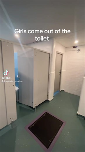 Unexpected Moments: Girls Exit the Restroom