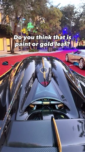 The one-of-one Koenigsegg Agera RS Phoenix sits in the pre-dawn silence at The Miami Concours 🌌 Every line of exposed carbon fiber is highlighted by hand-laid 24-karat gold leaf ✨ — a level of craftsmanship only a few in the world will ever witness. 1,300 horsepower. Mythical design. A hypercar that doesn’t just move… it glimmers before sunrise 🏁 Phoenix isn’t just rare. It’s a rolling masterpiece. #Koenigsegg #AgeraRS #KoenigseggPhoenix | Kurt Harfmann Supercars