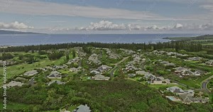 Maui Hawaii Aerial v12 flyover Kapalua Golf Course Resort capturing luxurious homes at Pineapple Hill lush neighborhood overlooking a Molokaʻi and Lanai island - Shot with Mavic 3 Cine - December 2022