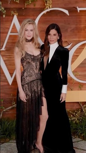 Sandra Bullock in Louis Vuitton and Nicole Kidman in Versace at the "Practical Magic 2" premiere LA