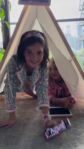 We love staying at the @1hotel.bklynbridge and this new sustainable sleepover package makes it even better!! Each kid gets their own tent, milk and cookies, a star projector, and movies and popcorn!! Mila and Emma obviously ❤️❤️❤️ it!! #1hotelpartner | The Stauffer Family