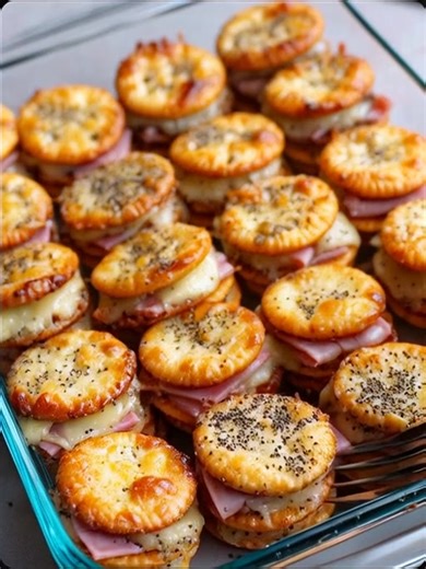 🥨 Ham & Cheese Ritz Sandwiches 🧀✨ These little bites are party-perfect! Buttery Ritz crackers, melty cheese, and savory ham come together for an irresistibly crispy, cheesy snack that disappears in minutes — just like at her son’s birthday! 🎉😋 💬 Get the Full Recipe 👇 (check c.o.m.m.e.n.t) 📌 Hashtags: #HamAndCheeseBites #RitzCrackerSandwiches #PartyFoodIdeas #EasySnacks #CheesyGoodness #FamilyFavorites #ChristmasYummyTable #TastyToobo #AppetizerGoals #SnackLovers | Cooking Recipes