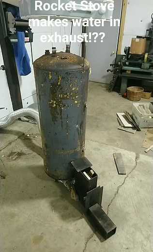 Rocket stove heater in my shop burns scrap wood. Makes water! Reduces my gas furnace run time by about 25% #rocketstove #woodheat #permaculture | Kurt Opposum Stuart