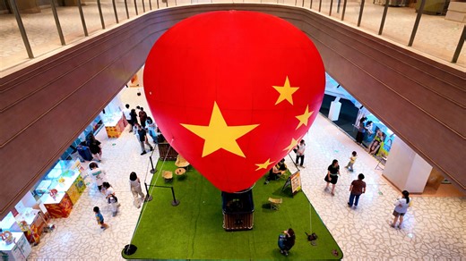 Experience a China mall where a giant balloon captures attention