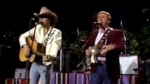 Dwight Yoakam & Buck Owens with "Streets of Bakersfield". "Streets of Bakersfield" is a classic country song that gained widespread popularity through the collaboration between Dwight Yoakam and Buck Owens. Originally written by Homer Joy and first recorded by Buck Owens in 1972, the song was re-recorded as a duet with Dwight Yoakam in 1988, bringing it to new heights of success. The duet version of "Streets of Bakersfield" was featured on Dwight Yoakam's third studio album, "Buenas Noches from 