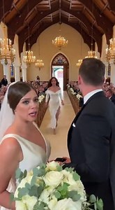 The Church Went Silent When Another Bride Walked In… And She Was Holding My Groom’s Hand The music was still playing. Guests were smiling. My veil hadn’t even settled yet. Then the church doors opened again. A woman in a white gown stepped inside. Not a guest. Not a bridesmaid. She looked straight at my groom. “I’m not late,” she said calmly. “I’m right on time.” I felt my knees go weak. “What is this?” I whispered. “Who is she?” My groom, Ethan, froze. His face drained of color. “Say something,