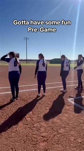 The Baird girls having some fun Pre-Game waiting on the umpires!