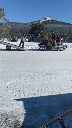 Parking the snowmobile on the trailer