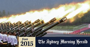 China stages live fire military drills