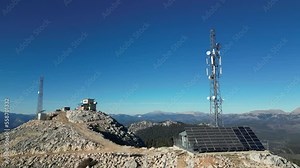 dominance fire watchtower and signal emitters at mountain peak