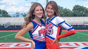 High school cheer during basketball postponed due to the pandemic