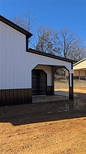 Well, here it is, folks. The dream barn is officially complete and it is stunning. This full width 48x30x14x9 barn features a 20x30x14 center area with 12x30x9 lean tos, walk in doors, a cupola, upgraded roof pitches, Dutch openings, windows, wainscoting, vertical siding, insulation, and a RUD remote control opening on the lean to garage door. The crew did an amazing job and every detail shows it. Come see this incredible demo on our lot. It honestly takes my breath away. #rebelcarports #barn #g