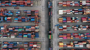 Time lapse,Aerial view At container ship terminal,Industrial business import and export Logistics and Supply Chain