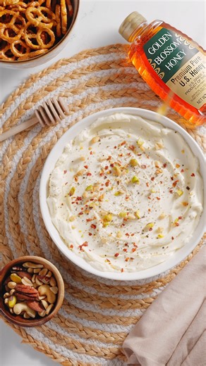 Whipped Feta is a quick and delicious snack that always satisfies. This dish combines creamy feta cheese and cream cheese with fresh basil, garlic, and a drizzle of Golden Blossom Organic Honey. Ready in just five minutes, it’s an easy addition to any appetizer spread. Find the recipe here: https://goldenblossomhoney.com/recipes/whipped-feta-by-livsfoodfeed/ | Golden Blossom Honey