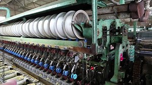 Industrial machinery for the production of silk thread.