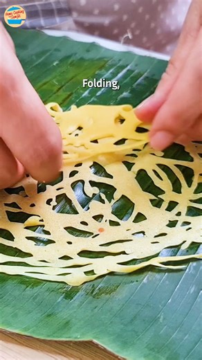 Special Malaysian Crepes | Roti Jala | Lace Crepes Airy, fluffy and very filling (not light!) these lace crepes, also known as "roti jala" are often served with chicken curry in Malaysia. They have a beautiful pattern that is made by swirling the special bottle with multiple nozzles over a non-stick pan, and rolled up into little cylindrical shapes once slightly cooled over a banana leaf for fragrance. Full Recipe: https://homecookingwithsomjit.com/roti-jala-malaysian-net-crepes/ #recipes #food 