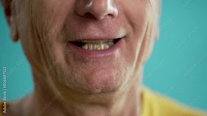 Talking old male mouth with bad teeth. Aging and retirement
