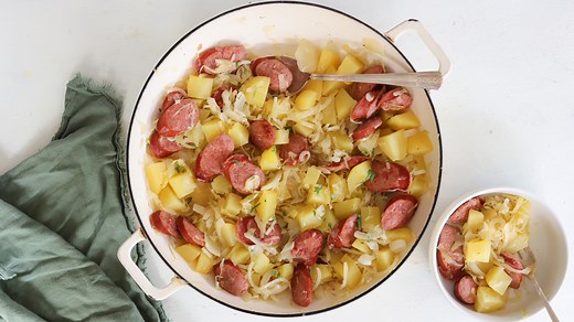 Kielbasa And Sauerkraut Skillet Recipe - Tasting Table