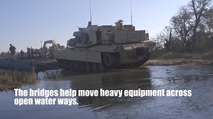 Bridging the gap. Watch these Marines conduct bridging operations at Camp Lejeune, N.C. The field exercise sustains mission essential training and standards and allows Marines to rehearse alternative methods of getting equipment to infantry units. #KnowYourMil | U.S. Department of War