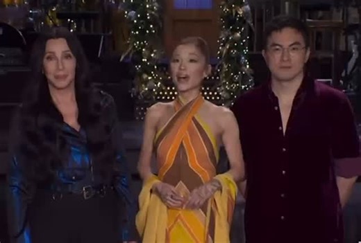 Ahead of hosting @nbcsnl with Cher this weekend, @arianagrande wears a vintage Bob Mackie multi-color silk-crepe chevron striped halter neck gown, with a matching shawl. The design was originally worn by @itscarolburnett for the opening monologue of The Carol Burnett Show. The episode aired on March 17, 1973. The gown was acquired via @juliens_auctions Styled by: @luxurylaw 🎥: via SNL #bobmackie #arianagrande #snl #cher #mackiemagic | Bob Mackie