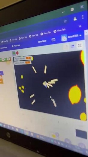 Playing the Lemonoid Invasion game I made on Scratch