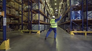 Warehouse Worker Dancing Between Racks Logistics Stock Footage Video (100% Royalty-free) 27156094 | Shutterstock