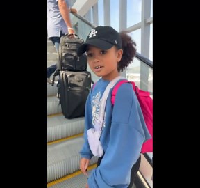 Cute Girl Dancing on Escalator at Airport