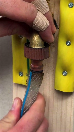 DIY wall mounted hose storage #diy #hose #trick