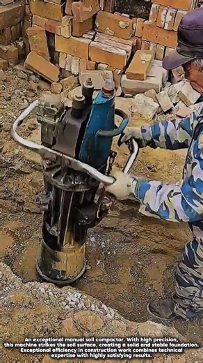 This worker compacts the soil using a tool with pinpoint precision.#shorts #construction #working