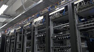 Row of Bitcoin Miners Set Up on the Wired Shelfs. Computer for Bitcoin Mining Stock Photo - Image of business, data: 102475334