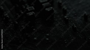 Computer parts macro closeup. Camera moving above structures of chips, microchips and processors on used board.