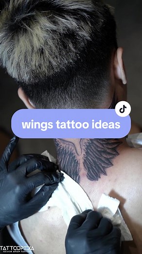Wing Tattoo Ideas on Neck