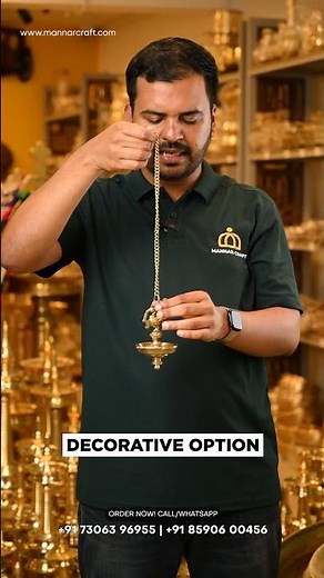 Mannar Craft Brass Peacock Hanging Diya, a handcrafted single-wick oil lamp perfect for temples and