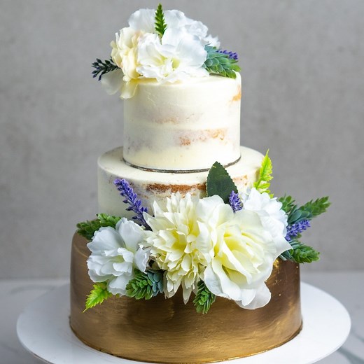 58K views · 1.2K reactions | A simple, elegant, golden wedding cake  | MetDaan Cakes | Facebook