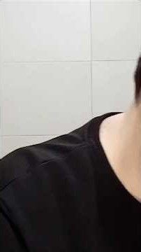 Shaving with a safety razor.