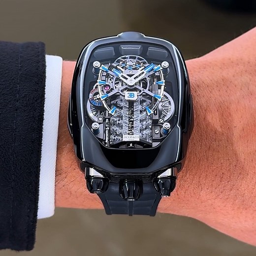 JACOB & CO. on Instagram: "The Bugatti Chiron Tourbillon in motion. Inspired by the legendary W16 engine, this timepiece comes to life with its stunning automaton. A 15-second spectacle of mechanical mastery that mirrors the heart of a hypercar. Where engineering meets art. 55 x 44-mm rose gold case W16 engine block automaton 30°-inclined flying tourbillon Power reserve indicator #Jacobandco #Inspiredbytheimpossible"