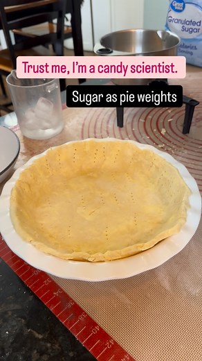 1.8M views · 2.3K reactions | My Roman Empire is figuring out how many things in my house can be replaced with sugar. Sugar as the pie weights: 1. It molds to every nook and cranny. 2. you can still use it!! Hello caramelized sugar cookies. 3. It makes you look like a whimsical baking menace. Come over, I’m baking all day. | One Sweet Mama | Facebook