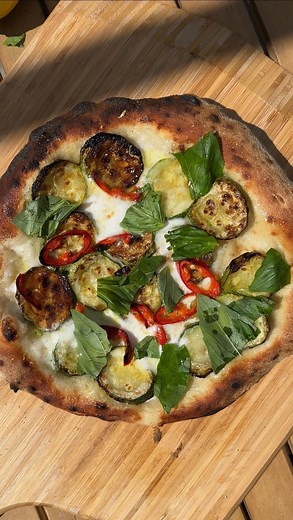 Natalia Rudin on Instagram: "Growing courgettes in our garden was the best idea we’ve had! It’s the easiest veg to grow and we are inundated with the most delicious juicy courgettes! AD Using them here in the @oonihq Karu 12G pizza oven for a delicious courgette, chilli and cheese pizza. So good! Ingredients: 1 ball of pizza dough 2 courgettes 1 ball mozarella 1 red chilli 1 lemon Fresh basil Olive oil, salt and pepper Method: Slice the courgette into rounds and drizzle with olive oil and salt. 