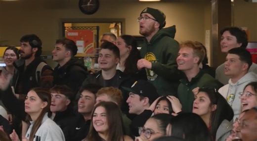 Siena Saints cheer on the men’s basketball team in the NCAA Tournament