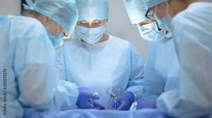 Surgical operating team performing thoracic surgery in modern hospital, health